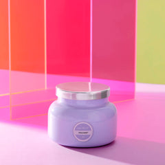Capri Blue Volcano lavender jar with flame, signature scent elevating home ambiance.