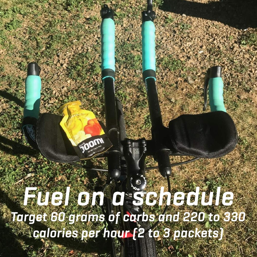 Carb Boom Energy Gel Raspberry finishing at the finish line with empty pack.