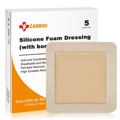 CARBOU sacral foam dressing applied on sacrum to maintain moist wound environment.