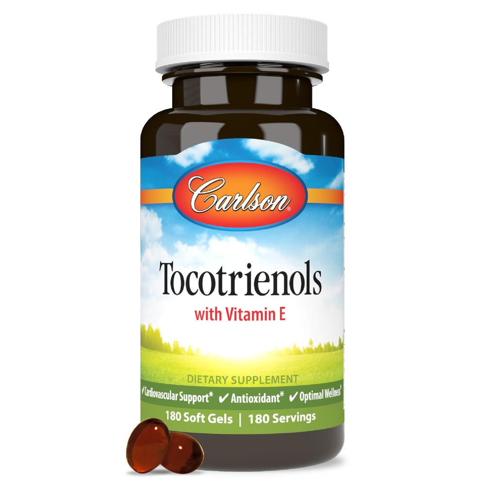 Carlson Labs Tocotrienols softgels bottle on table, convenient natural vitamin E source.