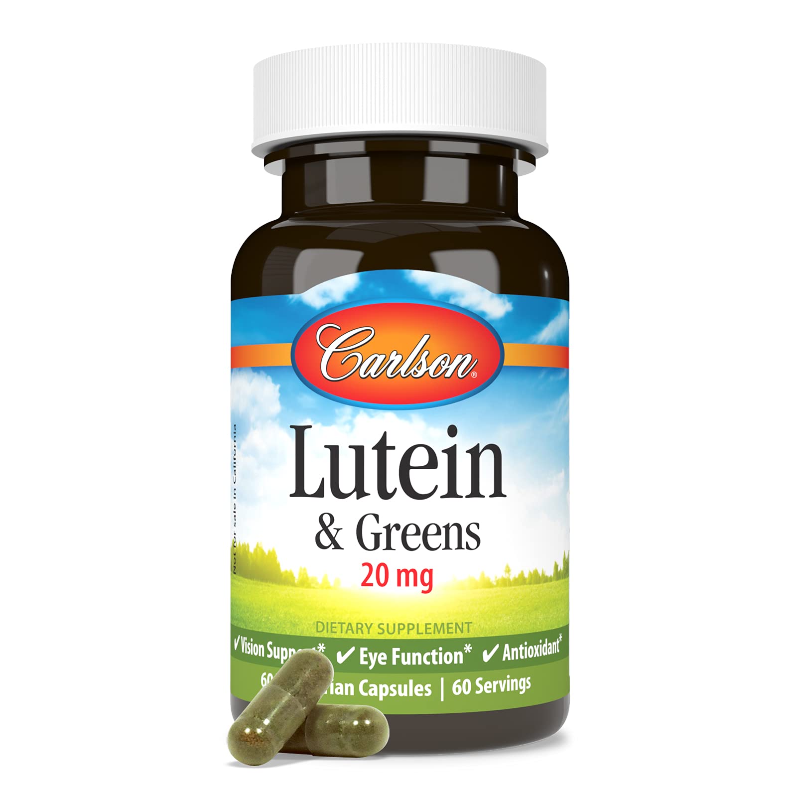 Carlson Lutein & Greens capsules on tray for vegetarian use.
