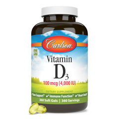 Carlson Vitamin D3 packaging on desk communicates trusted daily supplementation.