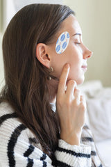 CarpalAid Migraine AID patches worn during daily activities