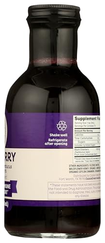 Cassie Green Health elderberry syrup bottle in use, convenient daily helper in home routines.