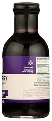 Cassie Green Health elderberry syrup bottle in use, convenient daily helper in home routines.