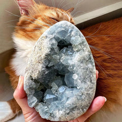Natural Celestine cluster with blue quartz geode for home decor and calm ambiance.