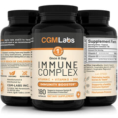 CGM Labs Immune Complex user holding bottle ready for daily use.