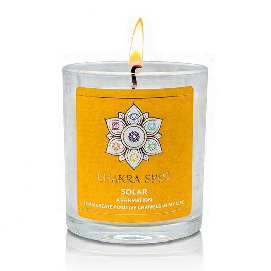 Chakra Spot Solar Chakra Candle in front view glowing yellow to boost focus.