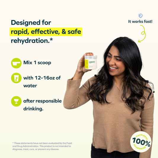 Cheers Hydrate in a glass of water with a scoop demonstrates easy mixing