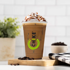 Serving idea with CHIKE iced coffee and ice cubes suggests quick energy on the go.