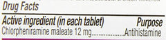 Chlor-Trimeton tablets in use with a glass in a real-life setting