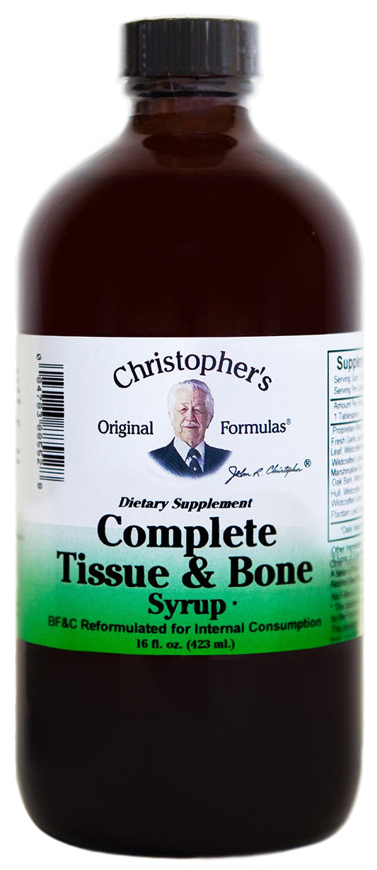 Christopher's Original Formulas Complete Tissue and Bone Syrup bottle on table supports tissue wellness.