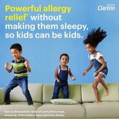 Claritin Children's Chewables Grapes tablet held for easy, tasty use