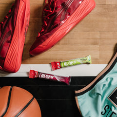 Non-GMO Clif Bloks Sours Green Apple chews for clean fueling.