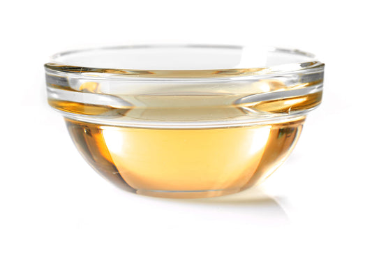Cocojojo massage oil pour demonstrates quick warm‑up and versatile use
