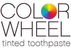 Smiling person with COLO Color Wheel Teeth Whitener showing a brighter smile.