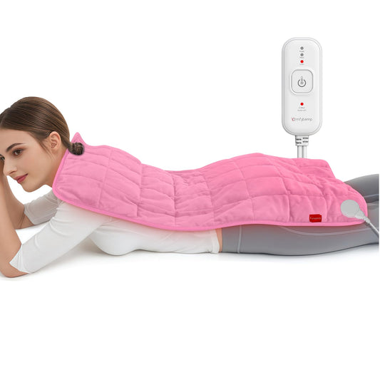 Comfytemp pink weighted heating pad on bed for full-body warmth and comfort