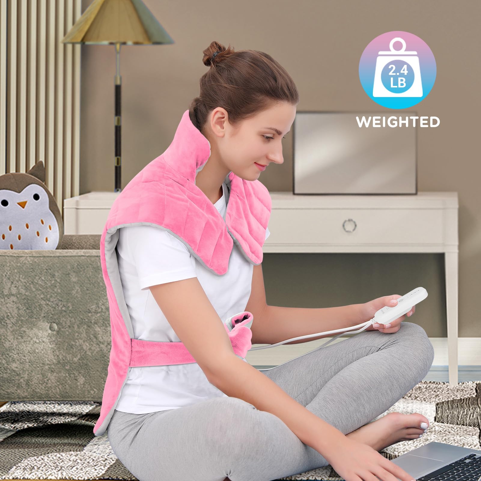 Comfytemp weighted neck-shoulder wrap in soft pink adds secure heat contact.