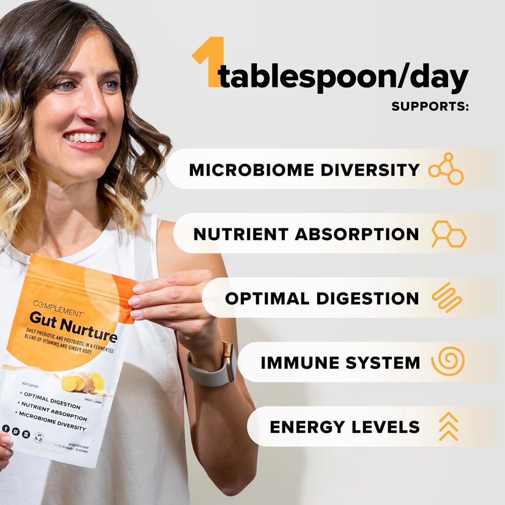 Complement Gut Nurture powder dissolving in a glass of water.