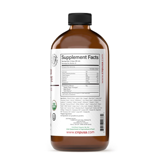 Complete Natural Products Uric Acid Complete liquid being poured for daily use.
