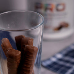 Core Nutritionals Pro Sustained Release Whey pour into glass for easy mixing.