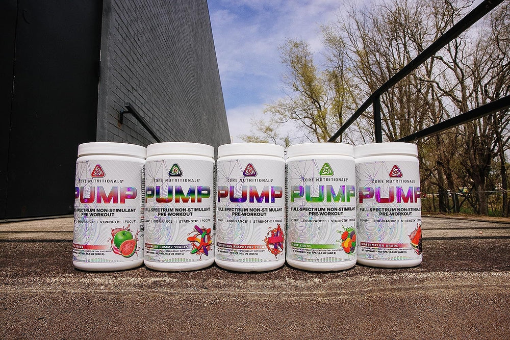 Core Nutritionals Pump scoop beside the tub, suggesting easy dosing for consistent performance support.
