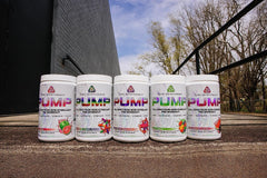 Core Nutritionals Pump scoop beside the tub, suggesting easy dosing for consistent performance support.