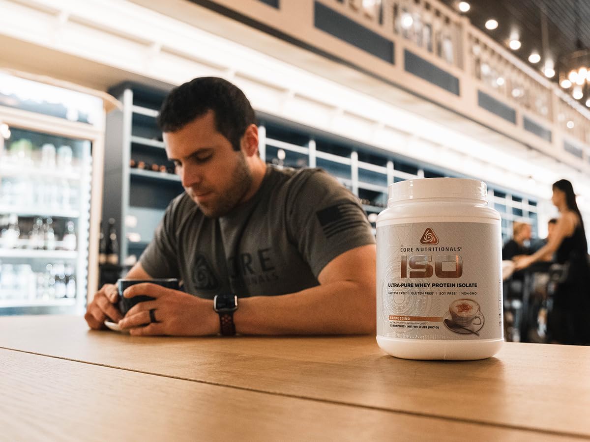 Core Nutritionals Ultra-Pure Isolate Whey Cappuccino powder scoop highlighting high-purity protein