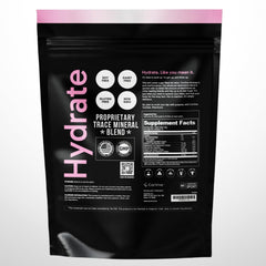 CorVive Hydrate pink lemonade powder close-up shows easy mix-in for rapid electrolyte replenishment
