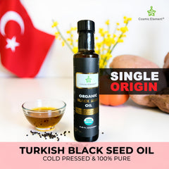 Cosmic Element Black Seed Oil label close-up emphasizing organic vegan formula