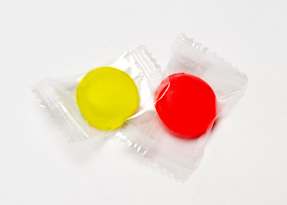 Cotton Mouth Candy fruit flavors with sugar-free formula on the front.