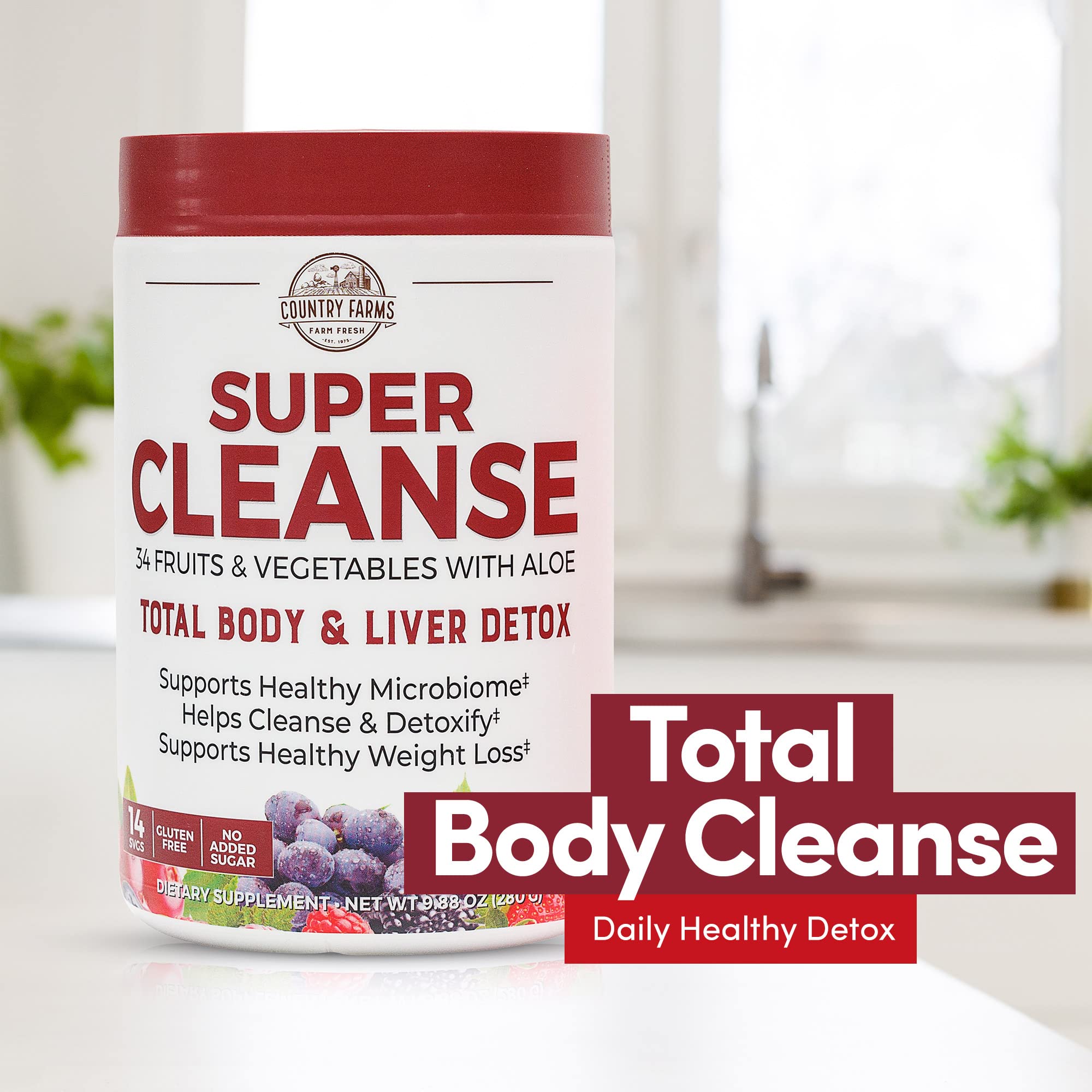 Country Farms Super Cleanse measuring scoop resting on the counter.