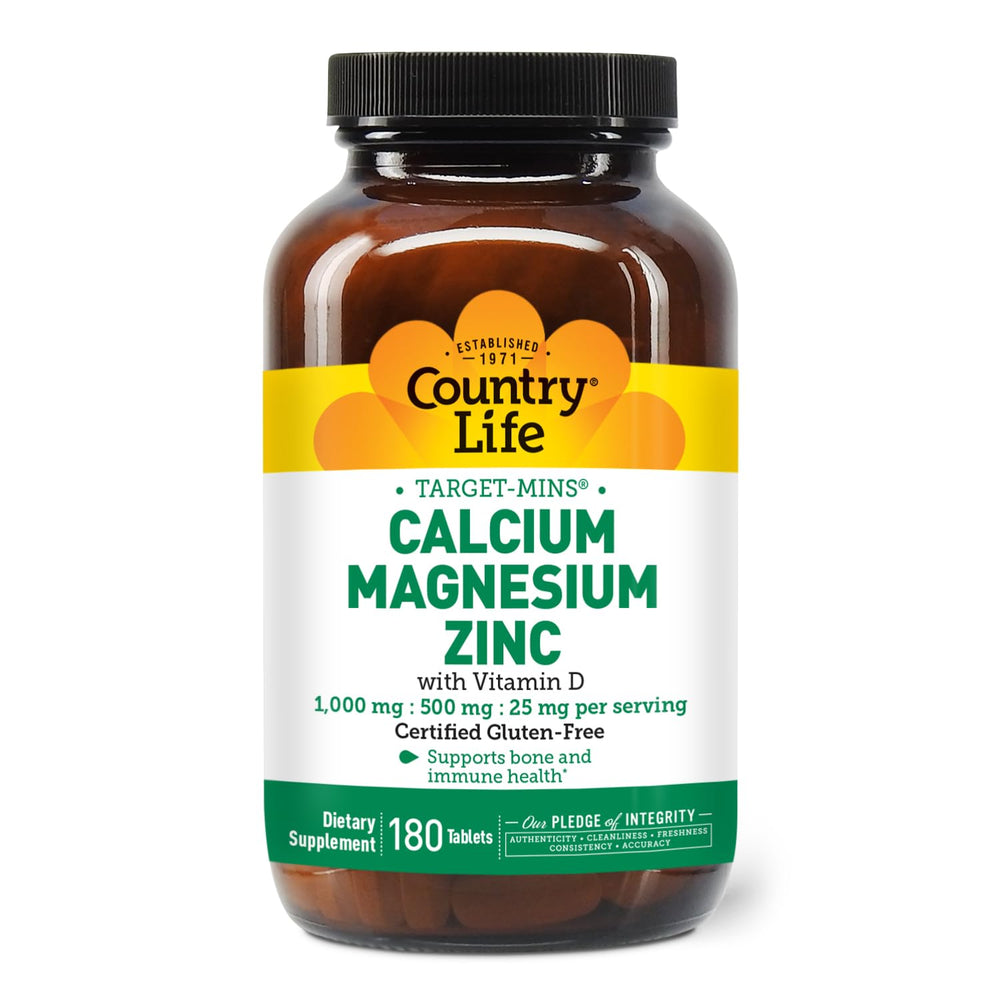 Country Life calcium magnesium zinc bottle dispensing shows convenient daily dosage.