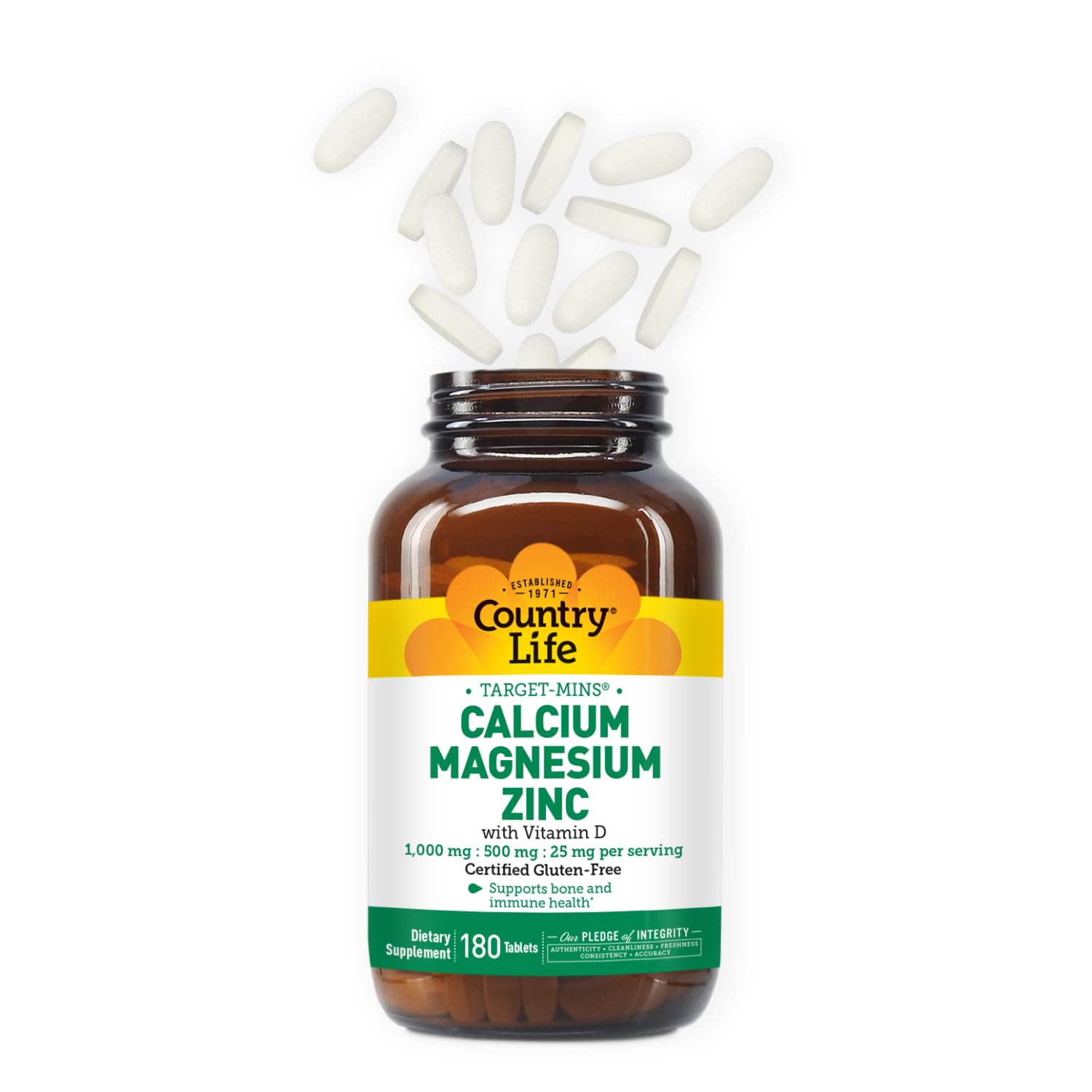 Country Life calcium magnesium zinc tablets closeup for enhanced calcium absorption.
