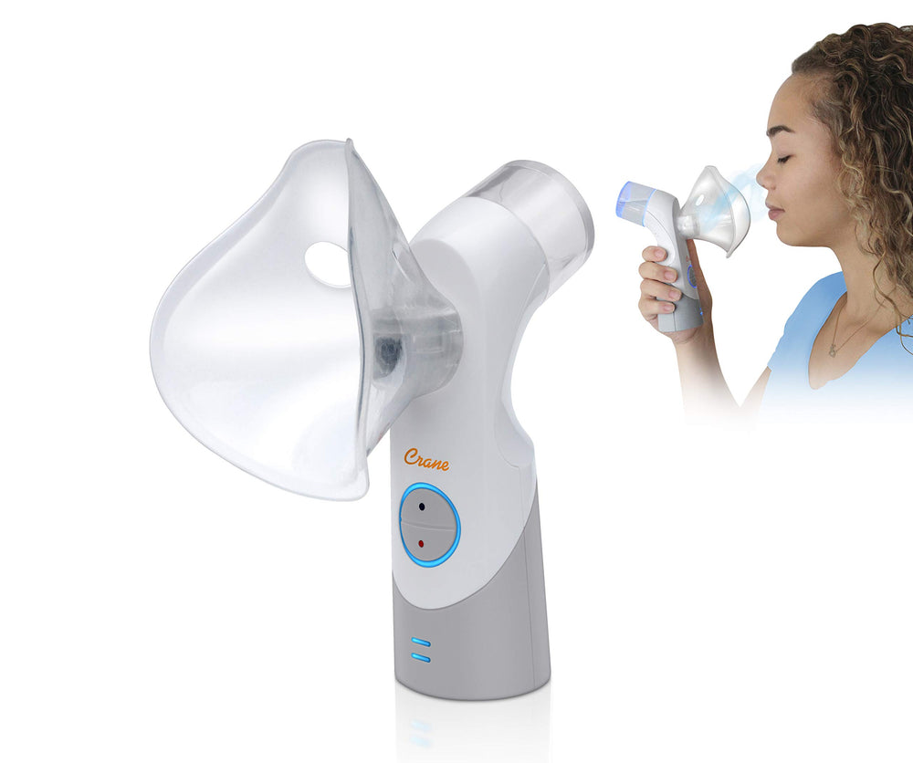 Crane inhaler cordless warm mist in use for nasal comfort