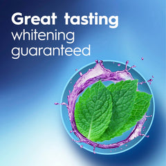 Crest 3D White Brilliance mouthwash pour action showing clean mint flavor