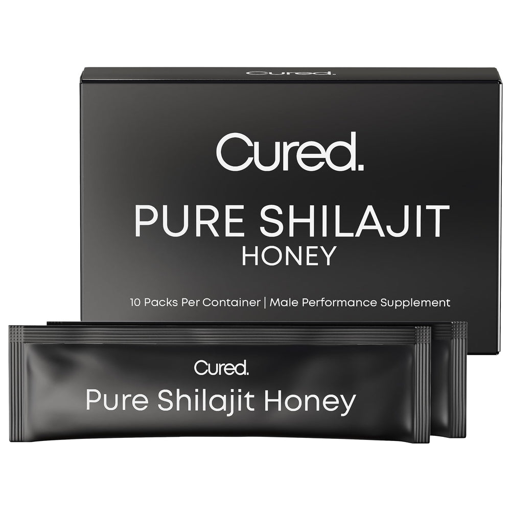 Cured Shilajit Honey Stick close-up on wood boosts natural energy