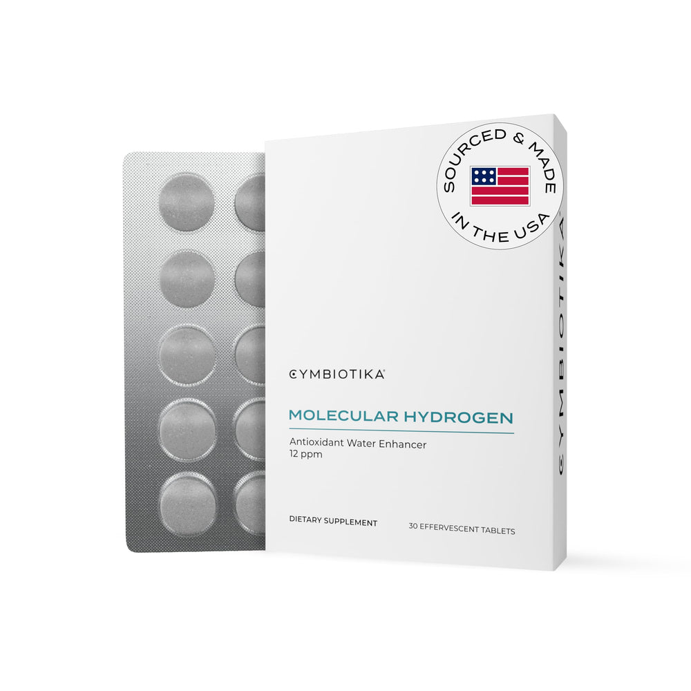 CYMBIOTIKA H2 tablet dissolving in water for hydrogen-rich hydration.