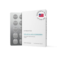 CYMBIOTIKA H2 tablet dissolving in water for hydrogen-rich hydration.