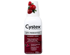 Cystex cranberry liquid being poured for daily use