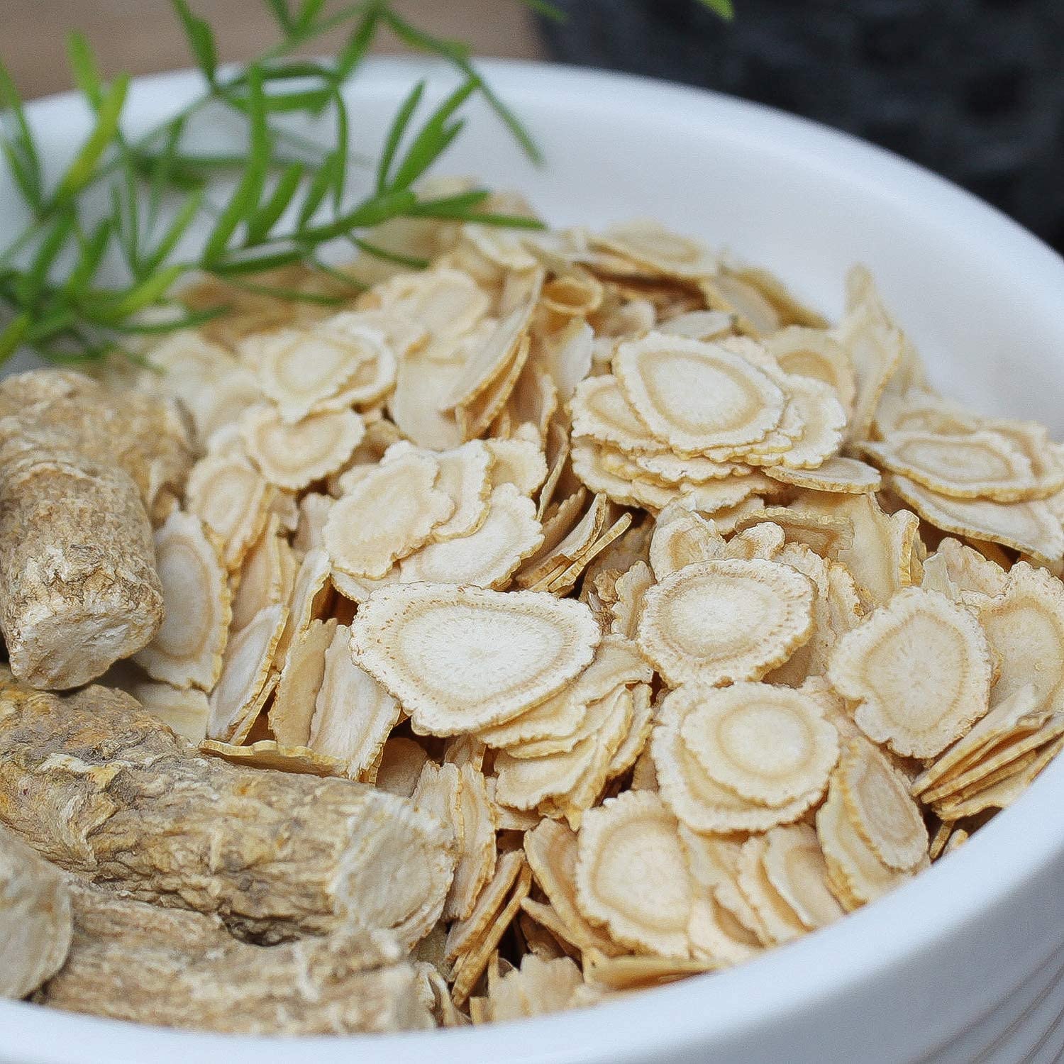 DABC OAK LAND ginseng slices ready to steep for tea and focus.