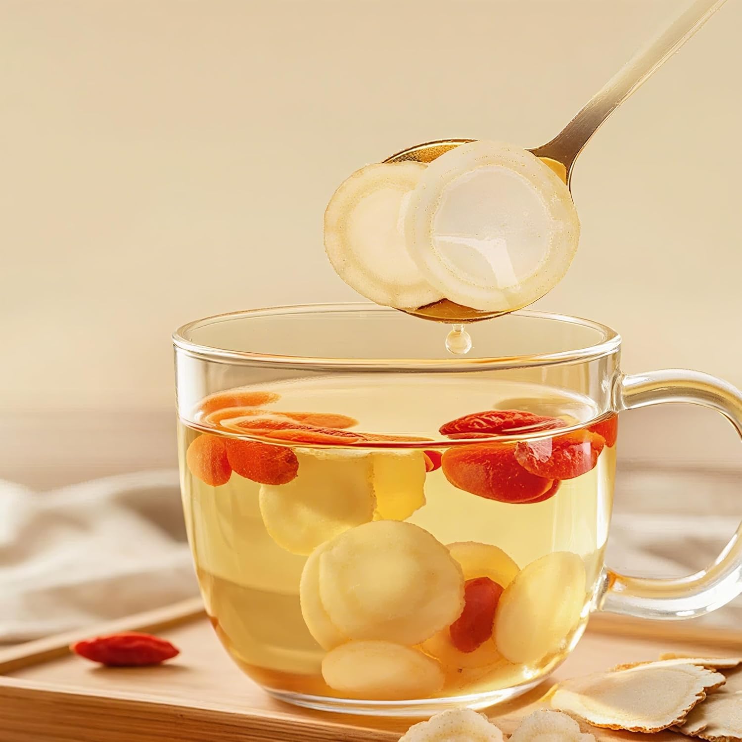 Ginseng slices steeped in tea cup for a gentle energy lift