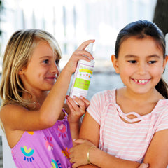Daily routine scene shows using the spray for hair care and prevention.