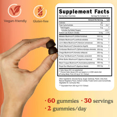 Two Daily Kind gummies in hand illustrate simple daily dose.