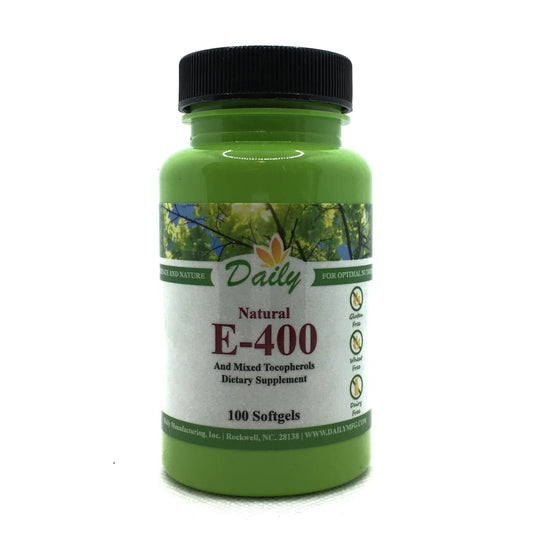 Daily Manufacturing Vitamin E-400 softgels bottle highlighting non-GMO formula and potent antioxidant support.
