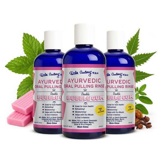 Dale Audrey bubble-gum oil pulling bottle promotes fresh breath and clean teeth.