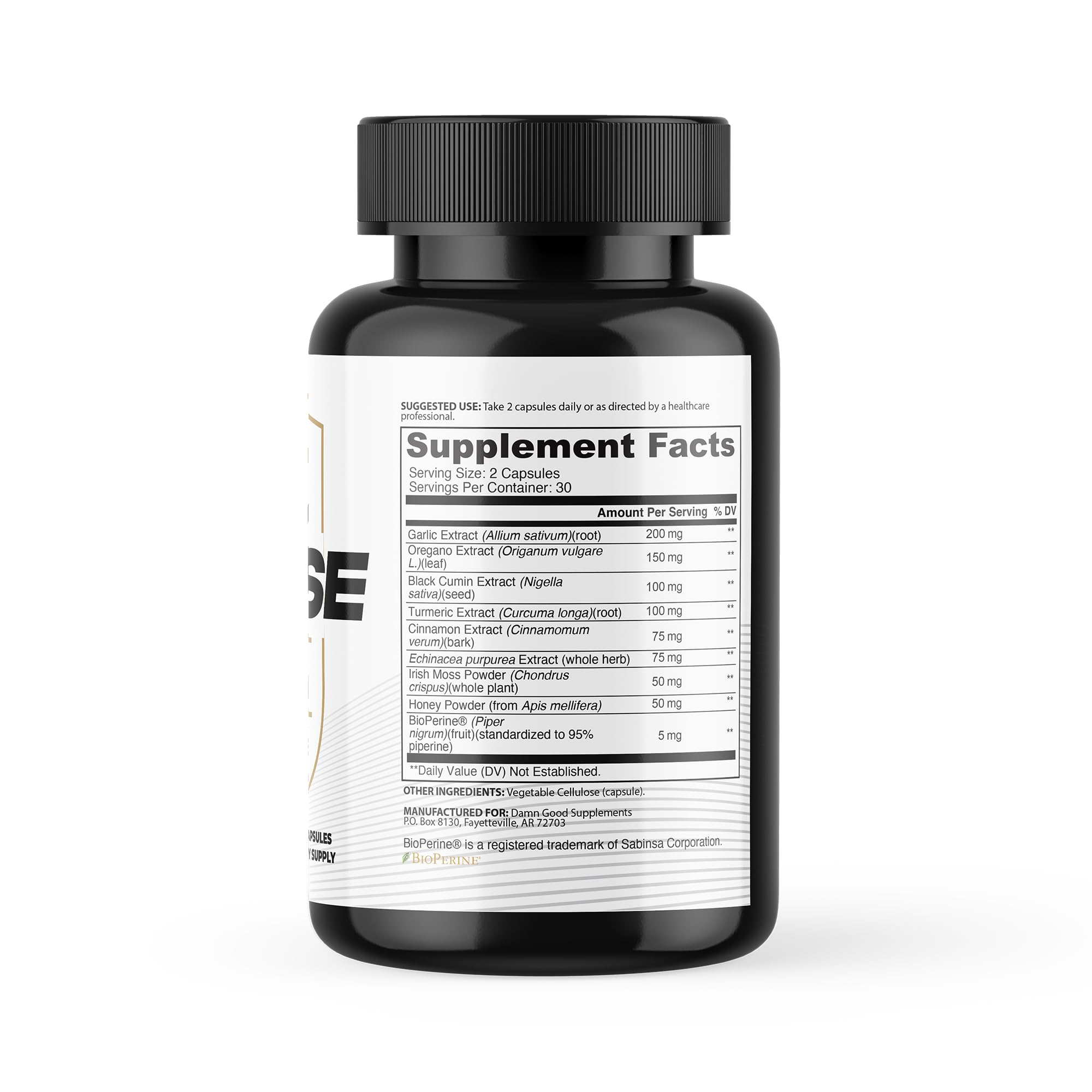 DAMN GOOD Hodge Twins Immune Defense bottle resting on wood surface