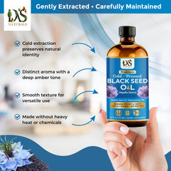 DAS NATURALS cold-pressed seed oil close-up reveals rich texture and color.