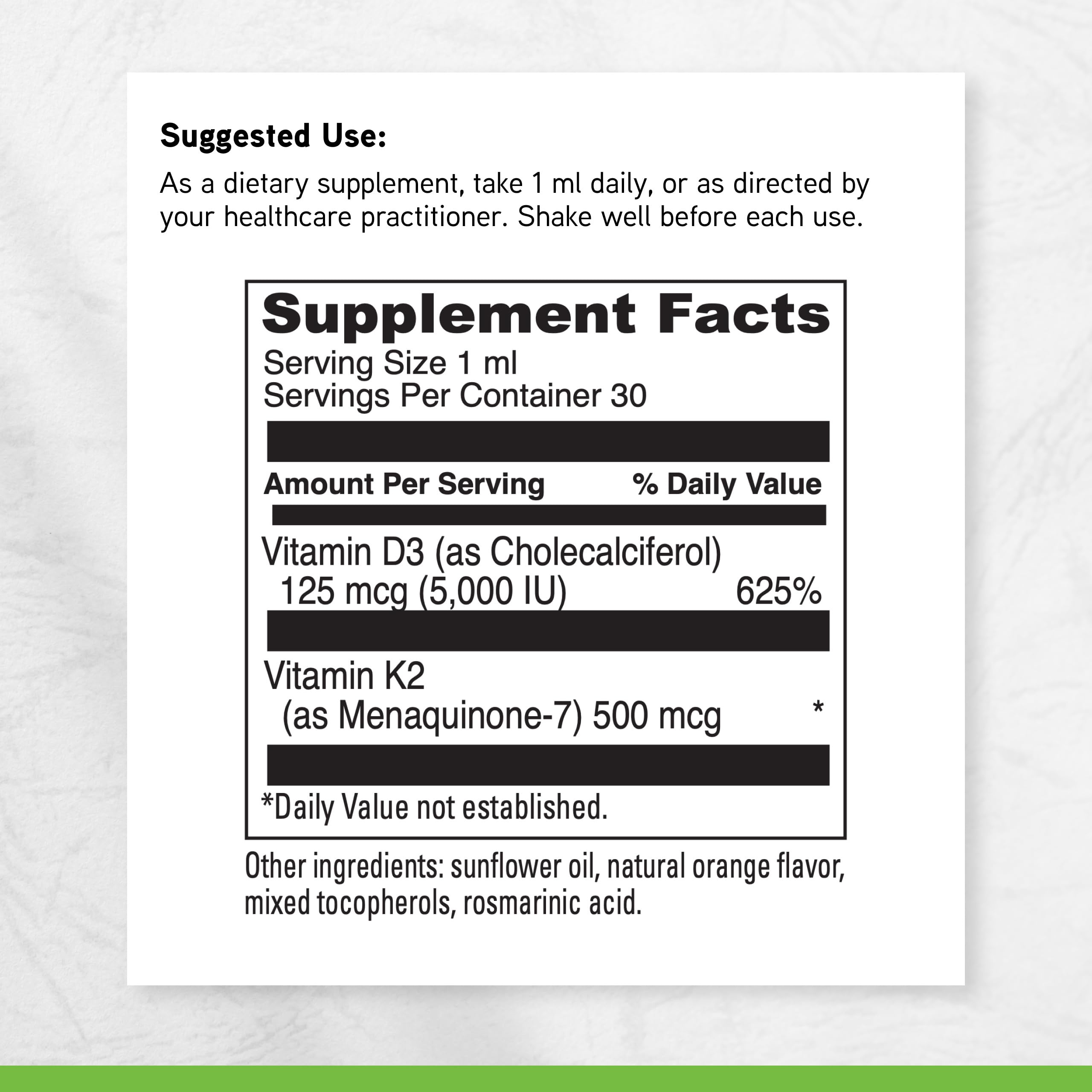 DAVINCI D3/K2 Liquid nutrition facts close-up with serving details.