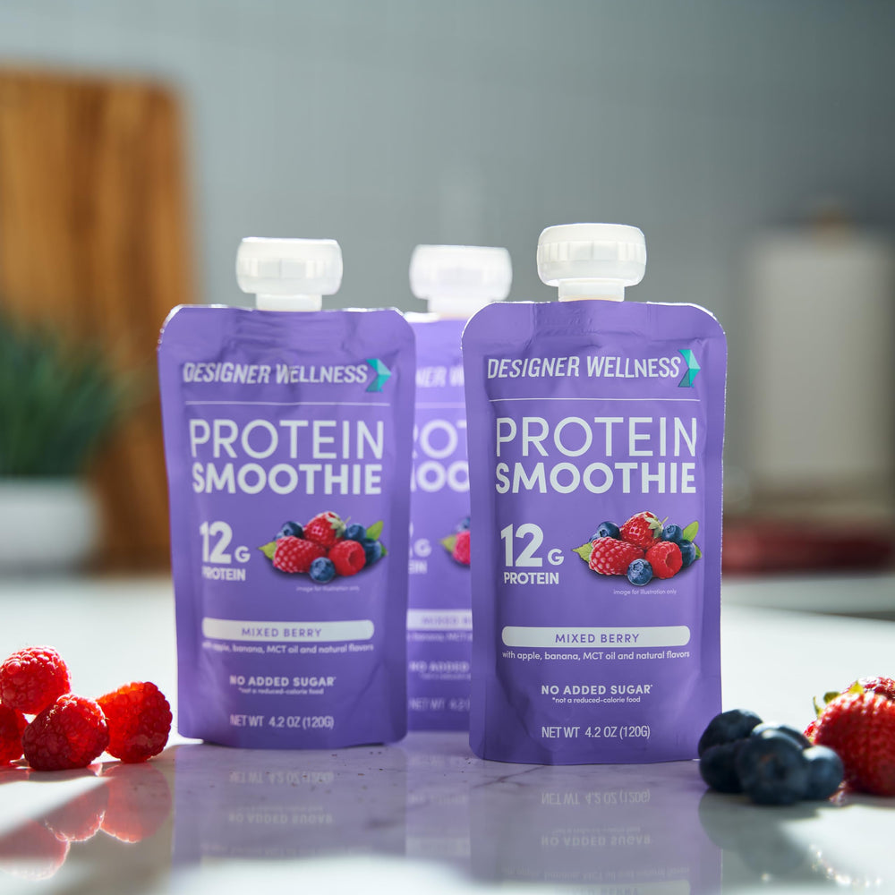 Designer Wellness mixed-berry serving cup illustrating everyday protein boost.